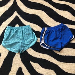 2 pairs of Nike running shorts